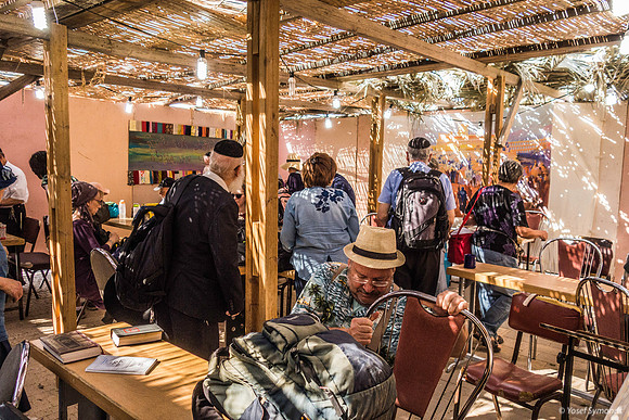 Guests Assemble in One of Yitzhar's Sukkot 191015-1