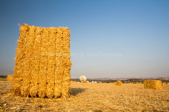 Haystacks in Field - Satellite Dishes in Background 170721-1