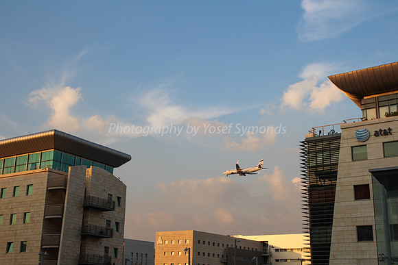 Plane Over Building - Airport City 6
