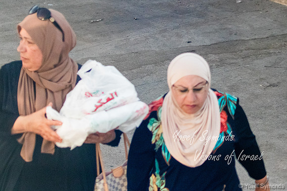 Arab Women Returning from Shopping 220615-1