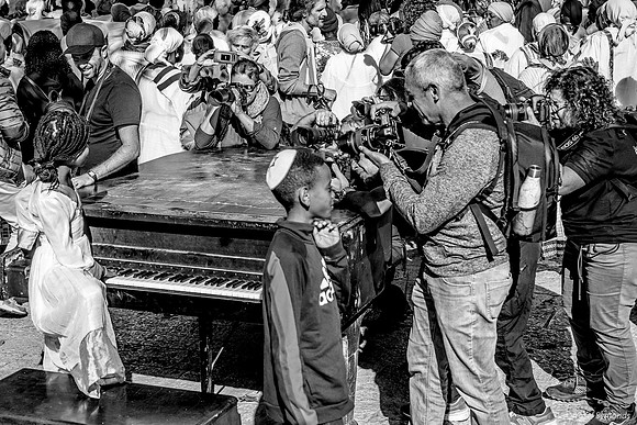 Girl Playing Piano and Playing to Crowd 221123-12