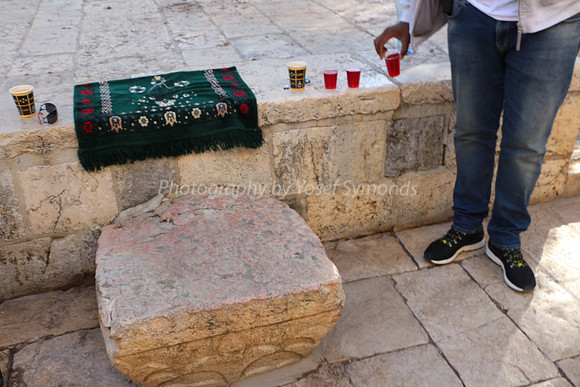 Ancient Column Capital Used as Seat by Wakf