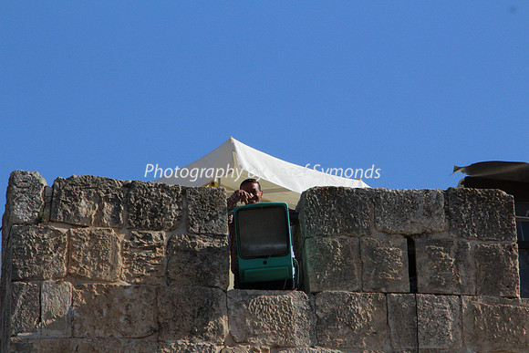 Waqf Guard Watching for Prayers