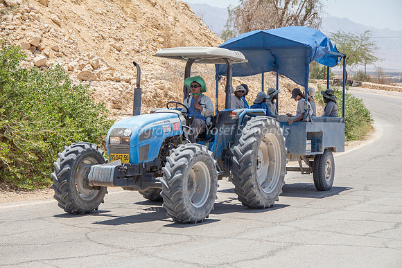 Workers Coming Up the Road on Tractor - Grofit 2