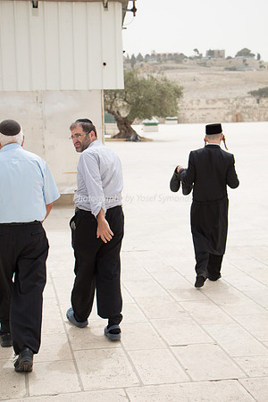 Jewish Men Circuiting the Site of Their Holy Temple