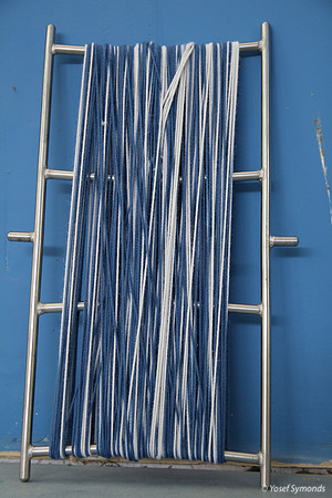Strings of Twisted Thread on Frame