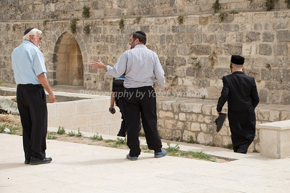 Jewish Men Circuiting the Site of Their Holy Temple