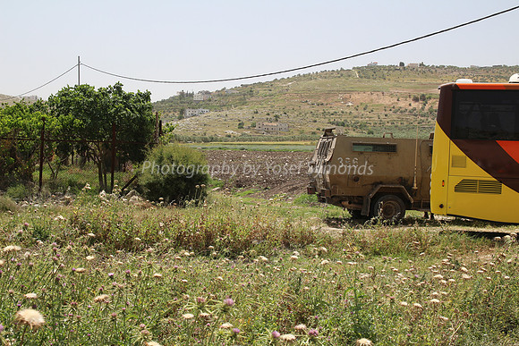 Armored Vehicle and Bus at joseph's Pit