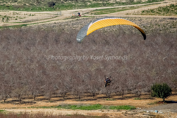 Powered Hang Glider Hovering Over Fields in the Haela Valley9