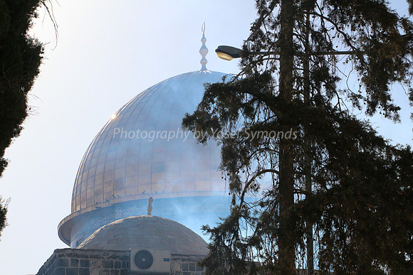 Holy Smoke Takes Gleam of Gold from Dome of Rock
