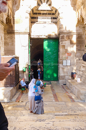Arab Ladies Passing Gate of Cotton Merchants