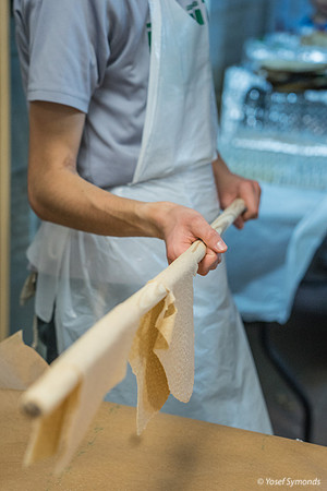 Carrying Matza Dough to Oven 190408-3