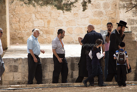 Jewish Men Circuiting the Site of Their Holy Temple