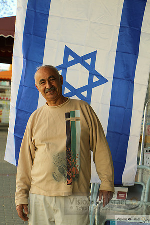Local Shop Owner and Israel Flag