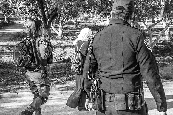 Young Arab Woman Passing Guards of jewish Group 3