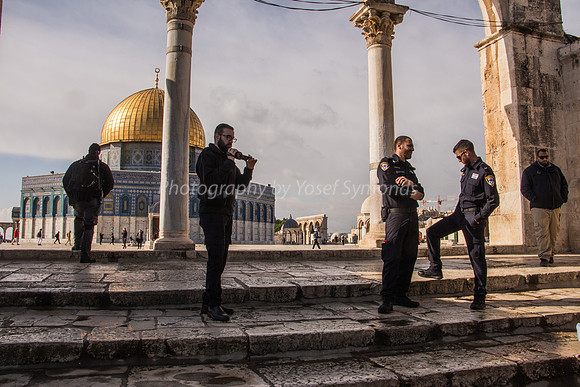 Policeman Videoing Jewish Visitors at Steps on North Side