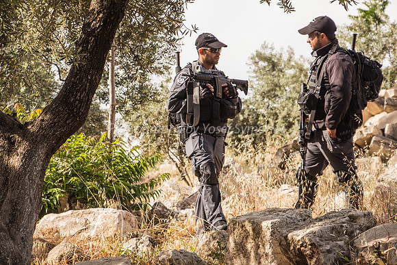 Policemen on Guard Near Eastern Wall