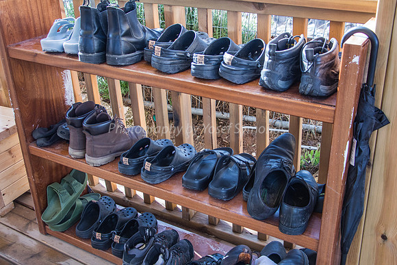 Shoes Left on Staging Platform by Vistors Ascending Barefooted