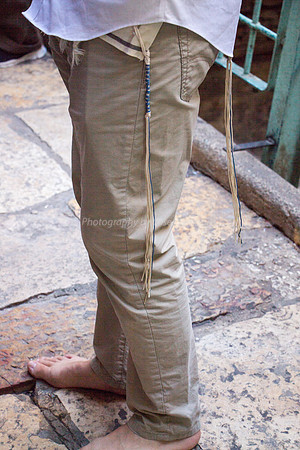 Bare Feet and Blue Tzizit