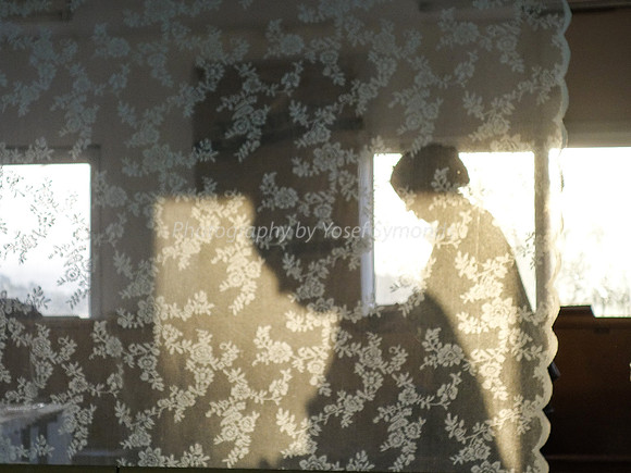 Lady Praying in Neria Synagogue 2