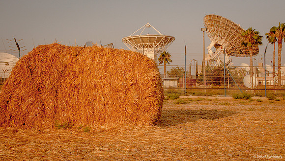 Haystack in Field - Satellite Dishes in Background 170721-16
