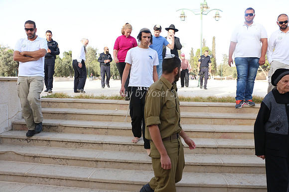 Jewish Visitors Flanked by Police and Wakf Functionaries