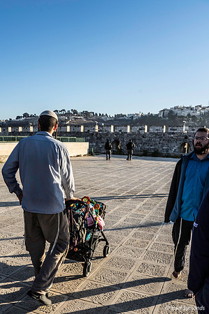 Visitor (R) Walking Backwards So As Not To Turn His Back on Place of Holy of Holies 191205-1