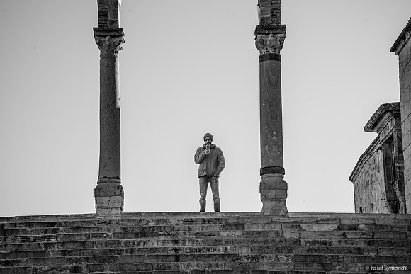 Silhouette of Man Under Stone Archway 191205-1