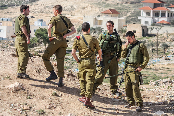Soldiers Guarding Shdema 100129-23