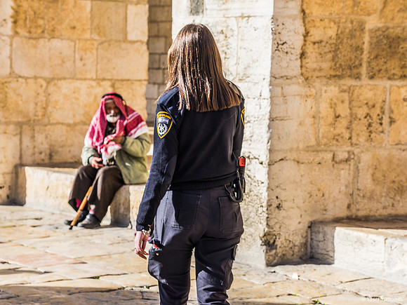 Policewoman and Arab Onlooker 200303-1