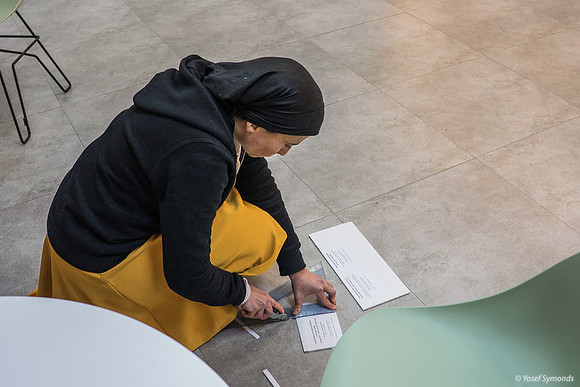 Curator Preparing the Exhibition 200209-1