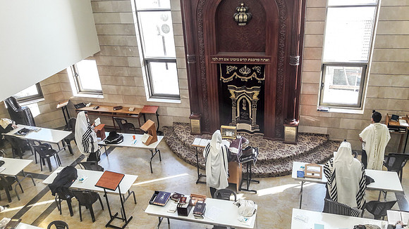 Praying at Aish Kodesh