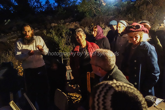 Visitors Being Addressed by Rabbi Meir Goldmintz of Givat Egoz 131204-12