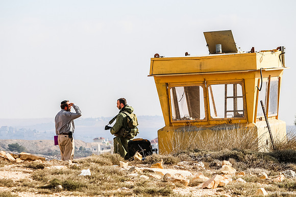 Soldier at Guard Box on Hill 131204-3