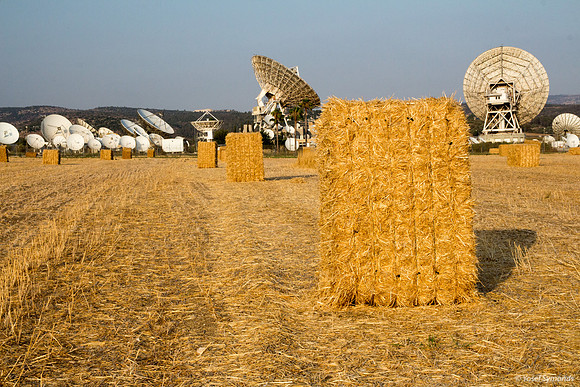 Haystacks in Field - Satellite Dishes in Background 170721-2
