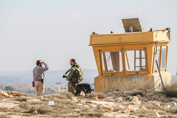 Soldier at Guard Box on Hill 131204-3