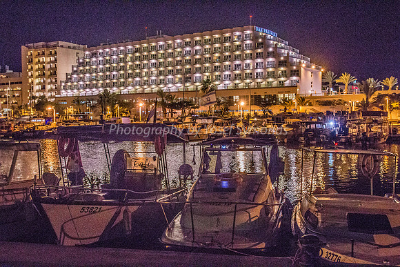 Boats Moored in Eilat with Dan Panorama Hotel in Background 180603-4