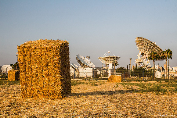 Haystacks in Field - Satellite Dishes in Background 170721-12