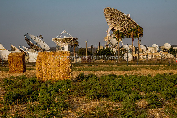 Haystacks in Field - Satellite Dishes in Background 170721-8
