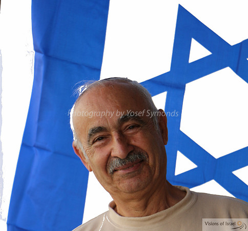 Portrait of Local Shop Owner and Israel Flag