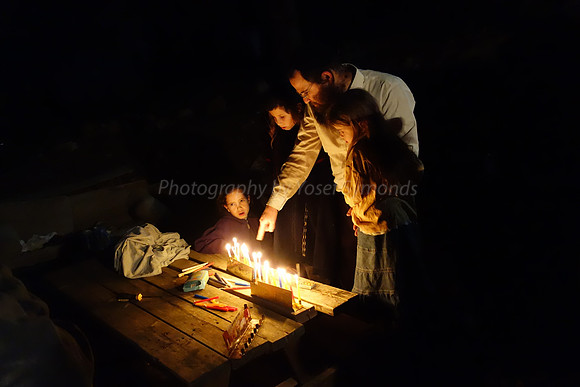Lighting Candles 8th Day Chanuka - Givat Egoz