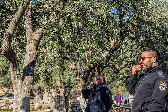 Policeman Contemplating and Wakf Representative Drinking