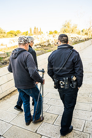 Man Being Assisted on Walk 190212-2
