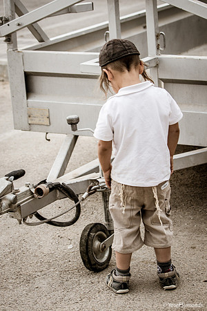 Young Resident Examines  a Trailer 191015-1