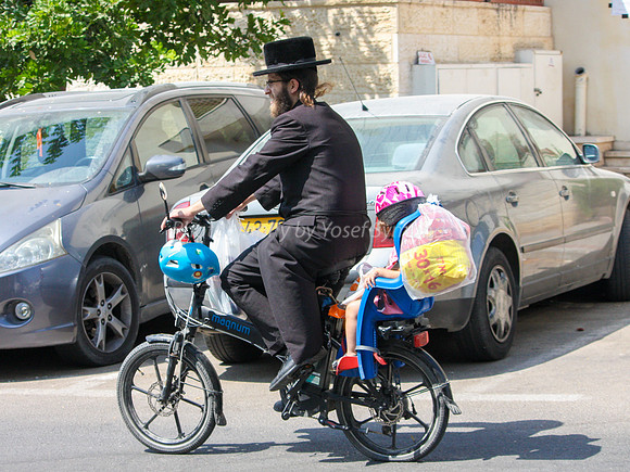 Hareidi Father Cycling with Daughter 2