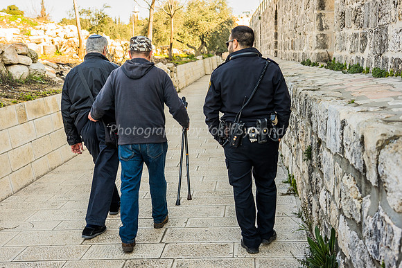 Man Being Assisted on Walk 190212-3