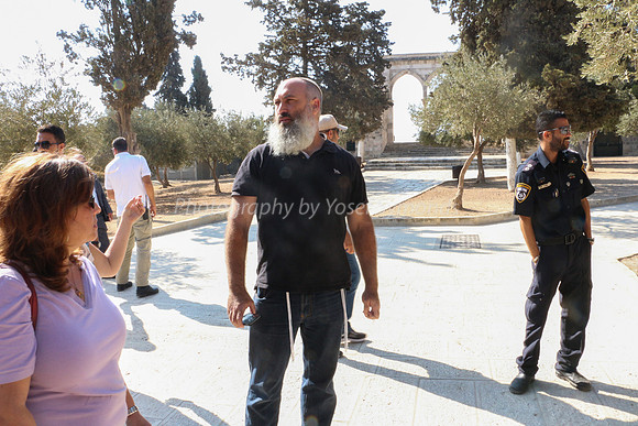 Tour Guide with Northern Gate in Background 2