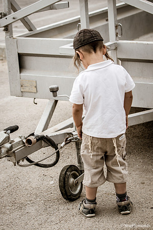 Young Resident Examines  a Trailer 191015-1