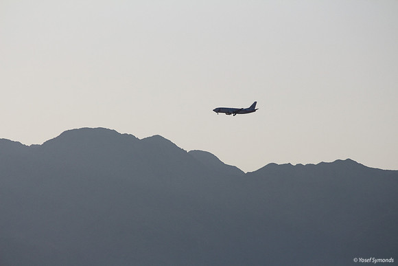 Plane Landing - Jordan Mountains in Background