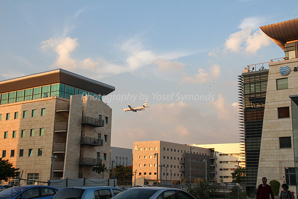 Plane Over Building - Airport City 7